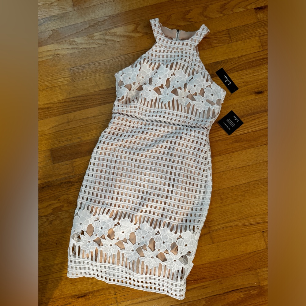White and skin colored midi dress with cut out floral detail